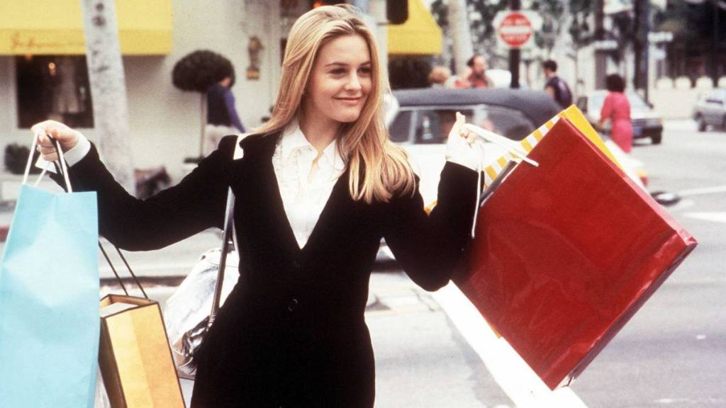 Woman holding shopping bags ; 90s teen movies