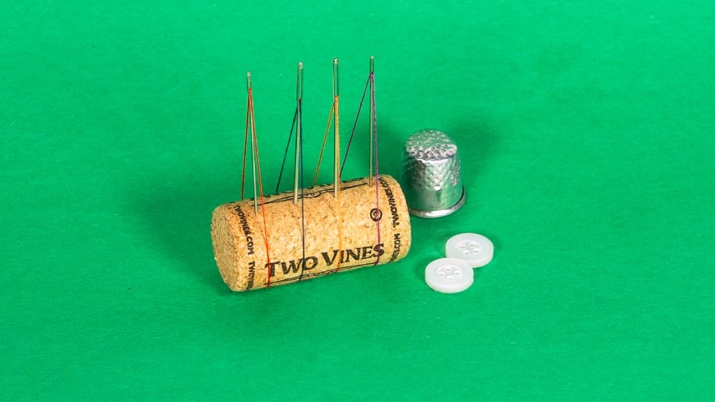 Storing sewing needles  is one of many uses for wine corks