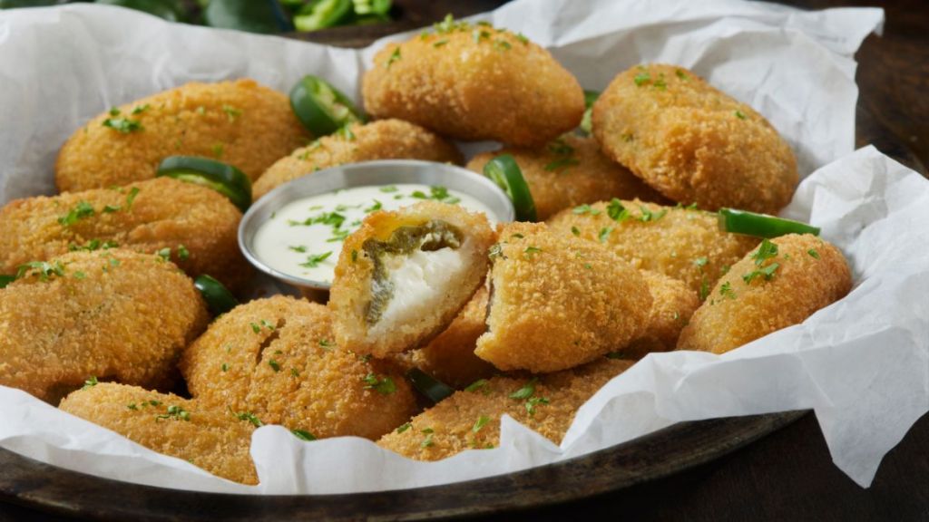 Crispy fried breaded jalapeño poppers with ranch dip