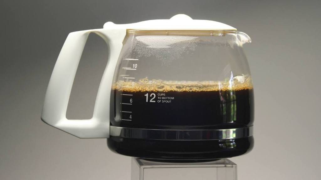 uses for ice cubes: Glass coffee pot with fresh hot coffee -