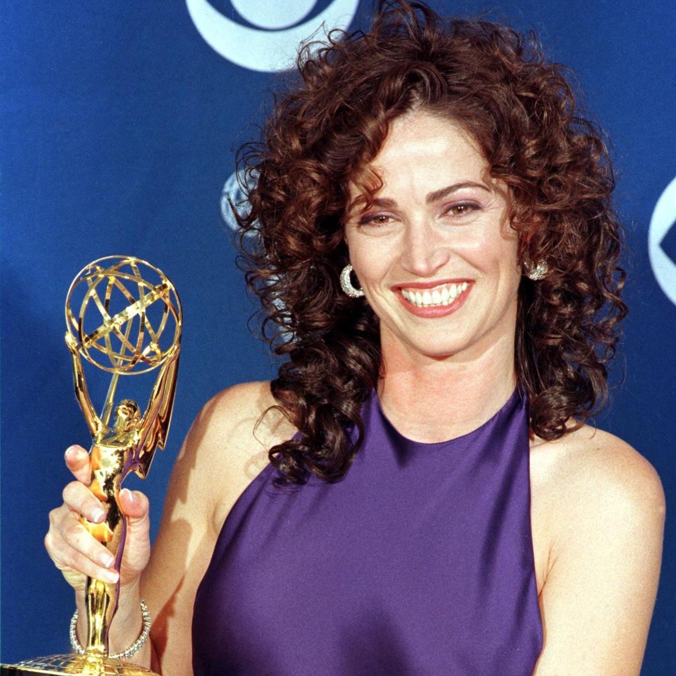 Kim Delaney poses with her Emmy Award for NYPD Blue, 1997