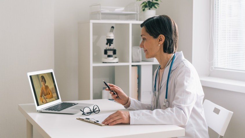 Doctor having virtual appointment with patient