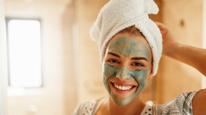 woman with matcha face mask on for matcha benefits for skin