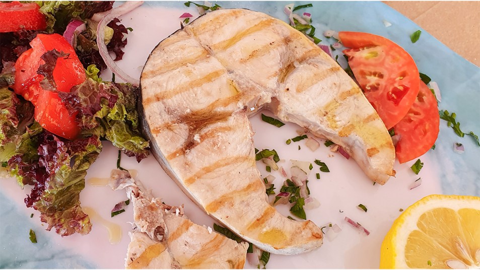 grilled swordfish on a plate; symptoms of mercury toxicity