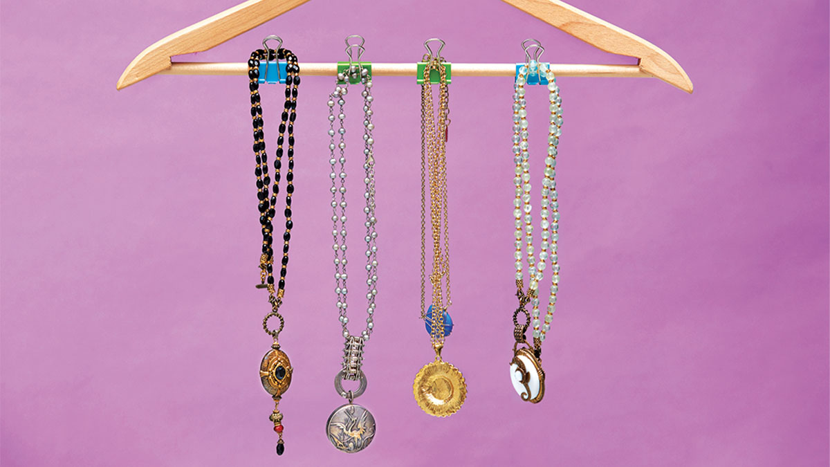 necklaces hanging on binder clips