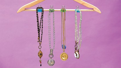 necklaces hanging on binder clips