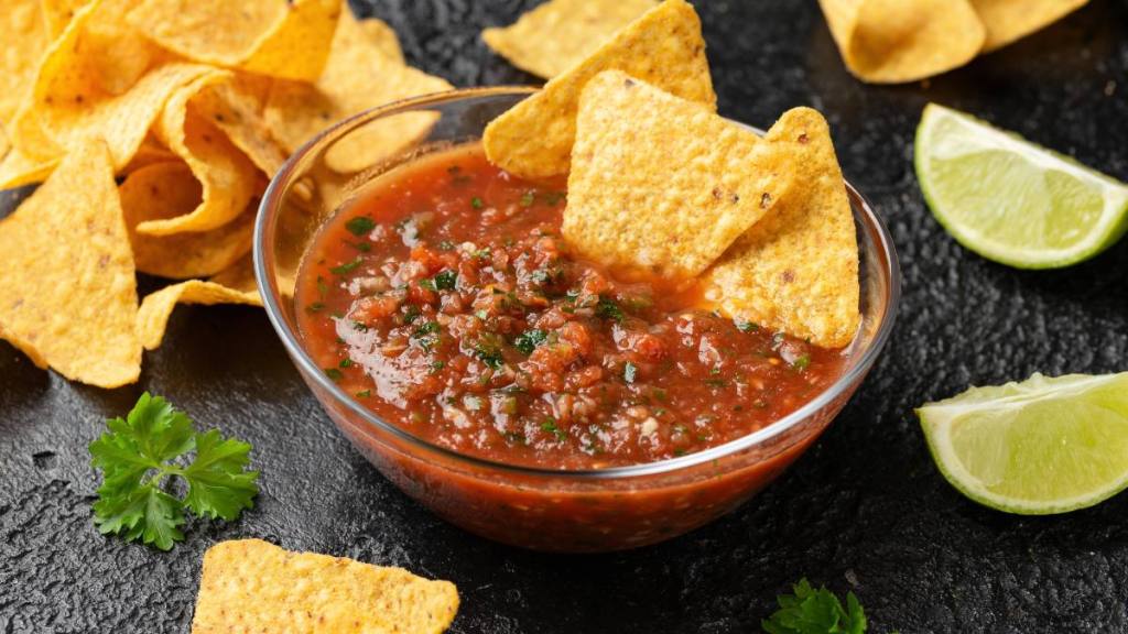 uses for sugar: Mexican Tomato Salsa with lime, onion, jalapeno pepper, parsley and tortilla chips.
