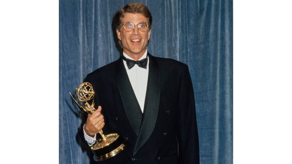 Ted Danson with an award