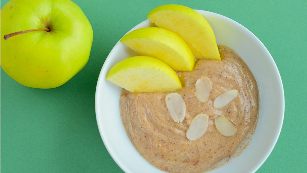 Green apple with almond butter; plant based whole 30 