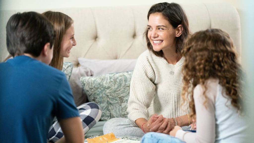 Katie Holmes with kids on bed; katie holmes movies and tv shows