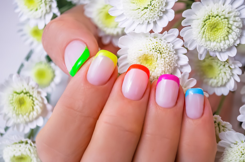 Rainbow French tips manicure