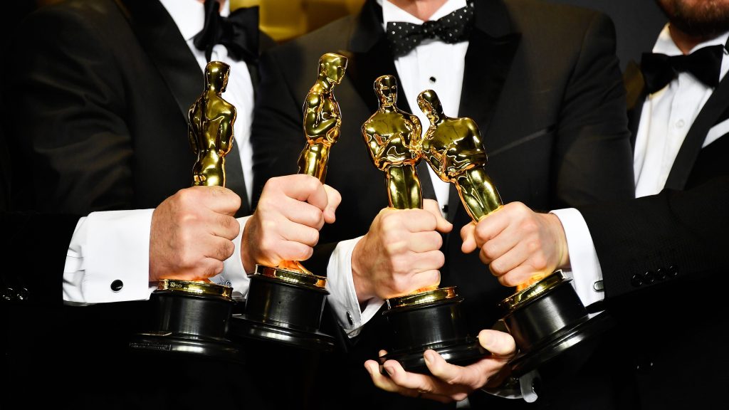  Sound mixers Peter Grace, Robert Mackenzie, Kevin O'Connell and Andy Wright, winners of the Best Sound Mixing award for Hacksaw Ridge, Academy Awards, 2017