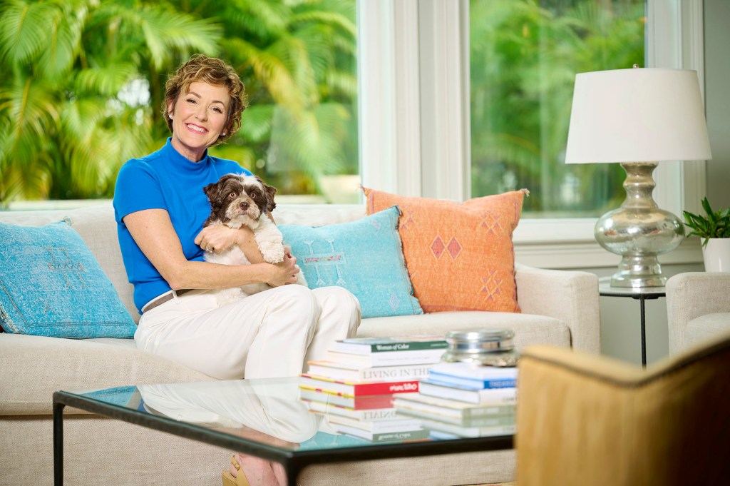 Cindy McDaniel holding puppy