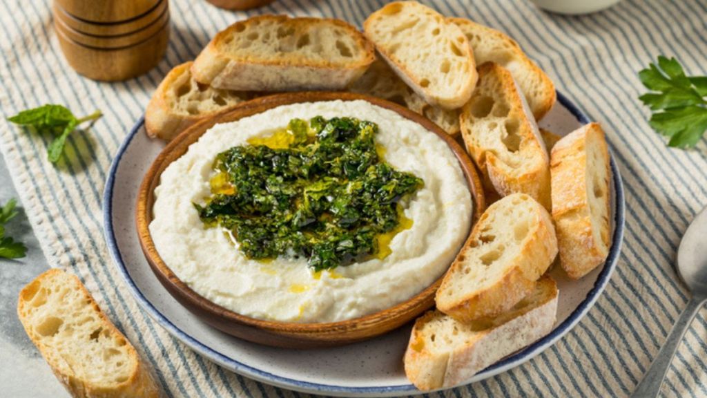 whipped ricotta: dip with honey, herbs and crostinis