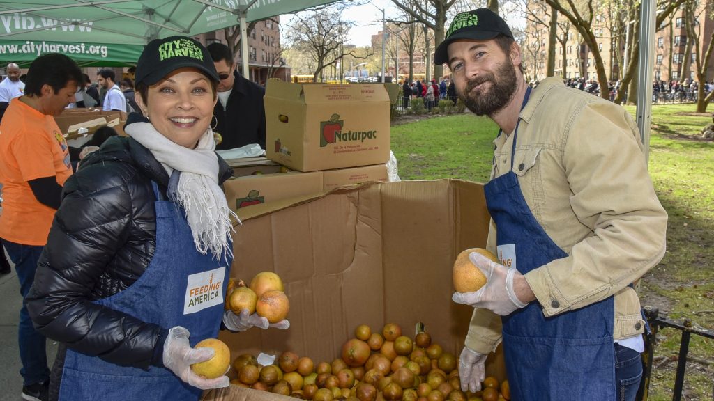 Ellie Krieger and actor Ryan Eggold volunteer with Feeding America and City Harvest, 2019