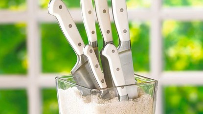 Uses for uncooked rice: create a knife block