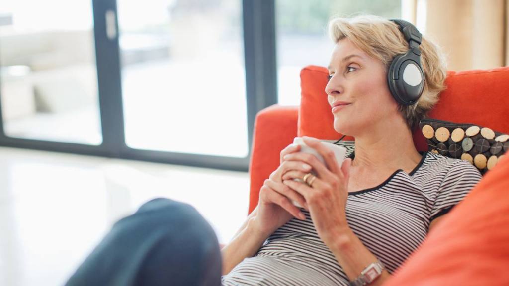 woman listening to music; more energy