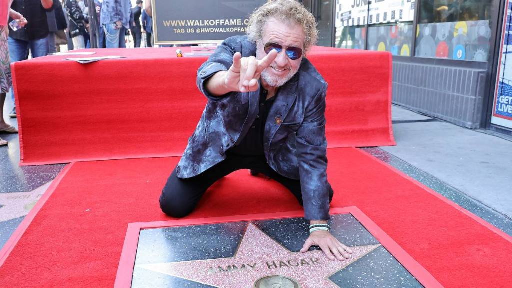 Sammy Hagar posing with star