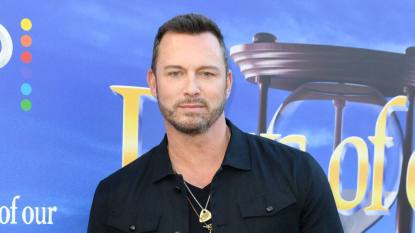 Man smiling at event; Eric martsolf Emmy