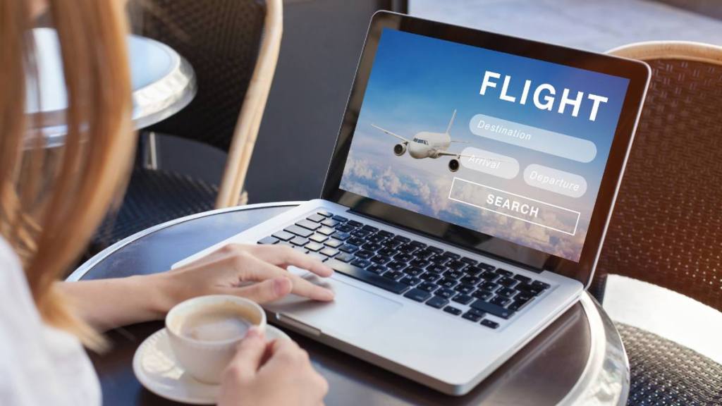 Work from home airline jobs: flight search on internet website, travel planning concept, airplane tickets online