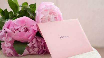 Mother's Day Card next to some flowers
