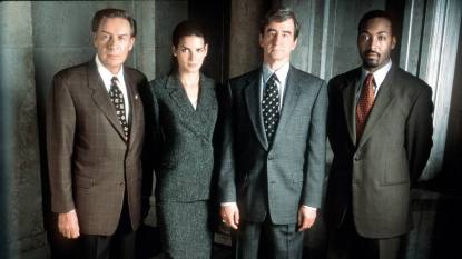 four people standing; law and order spinoffs