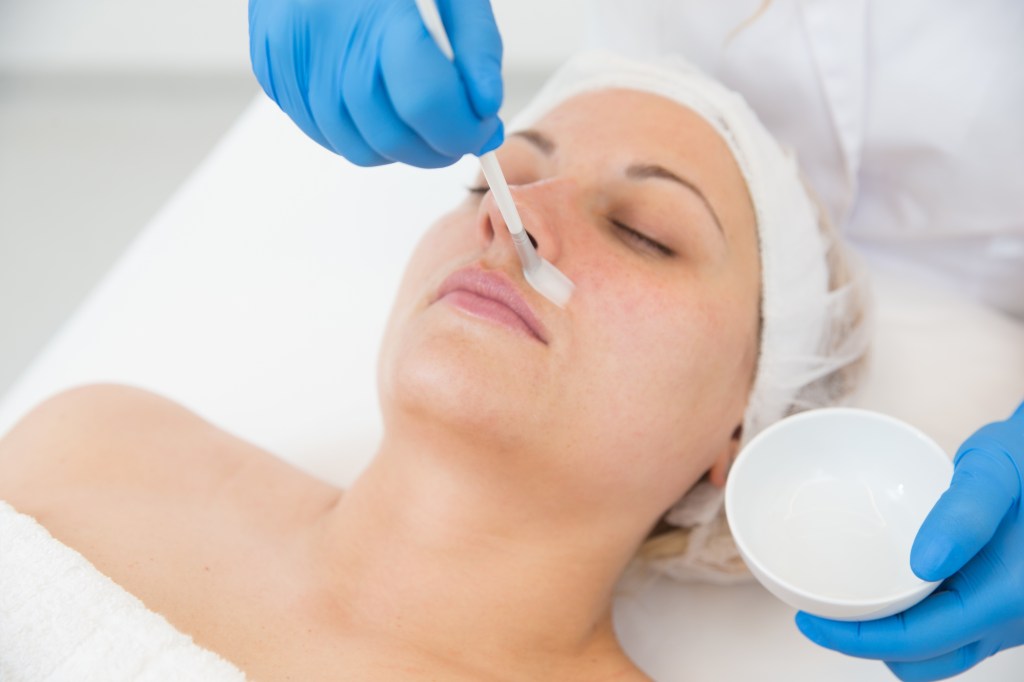 Woman getting a chemical peel done
