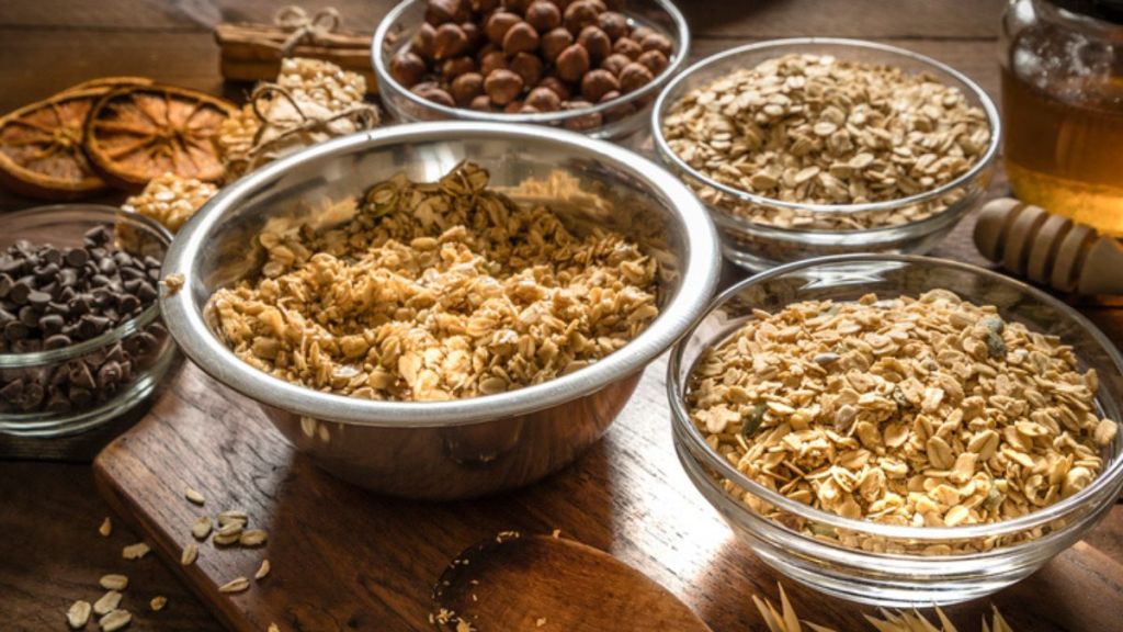 ingredients in bowls used for making homemade granola bars