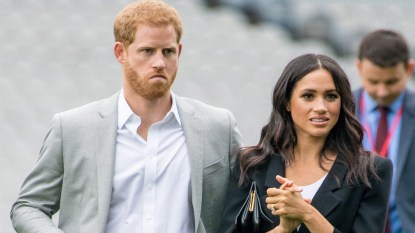 Prince Harry and Meghan Markle standing next to each other