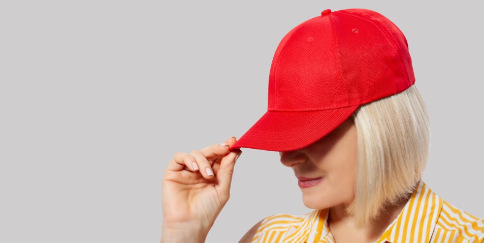 woman wearing a red baseball cap, for how to wash a baseball cap
