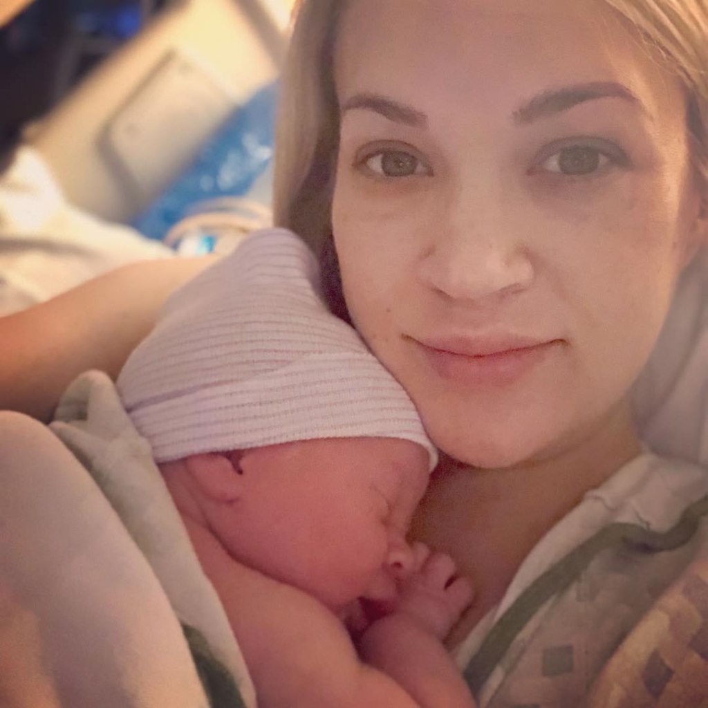 Carrie Underwood shares photo with newborn son on Instagram.