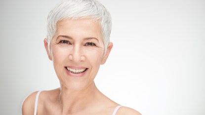 Senior woman with radiant skin after dermaplaning