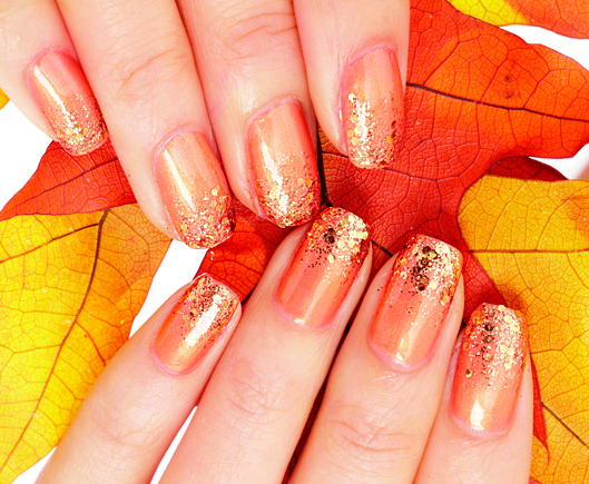 Orange nails with gold glitter gradient tips fall nail designs
