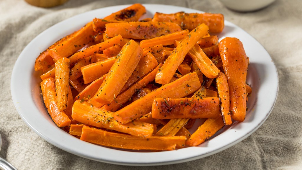 A plate of carrots that were cooked in the air fryer