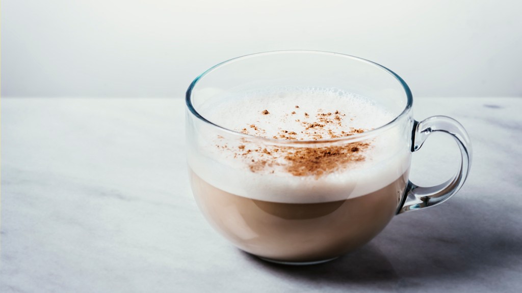 A cup of weight loss coffee topped with cold foam