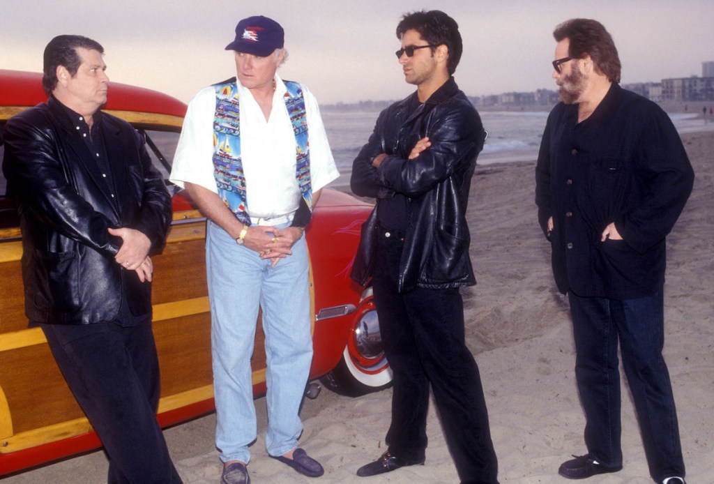 Brian Wilson, Mike Love and Carl Wilson of The Beach Boys, with John Stamos (2nd from right), 1995