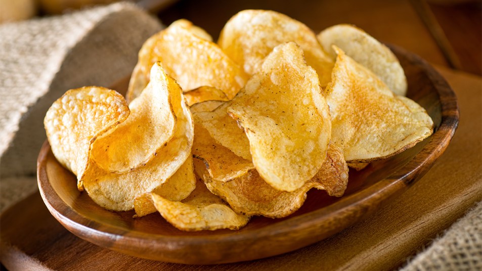 A serving of commercial kettle chips, which are not a healthy snack to eat frequently