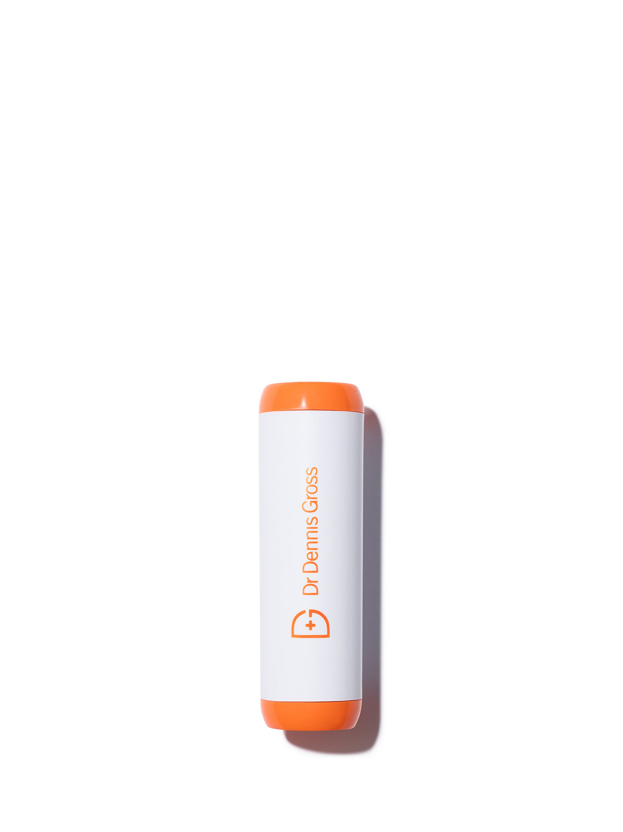 Dr. Dennis Gross DRX SpotLite Acne Treatment Device in orangd and white.
