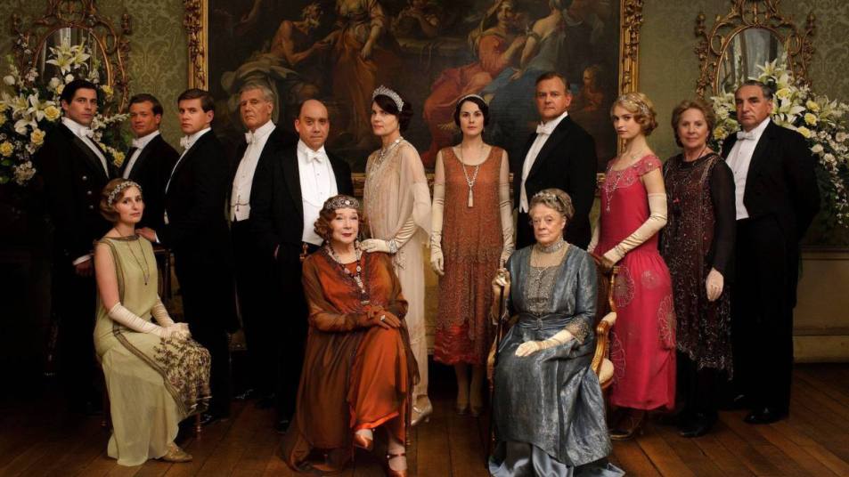 Downton Abbey Cast poses in pinks, oranges, whites, greys and blacks