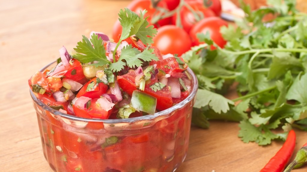 A bowl of salsa topped with cilantro, which is a food swap that reduces diabetes risk