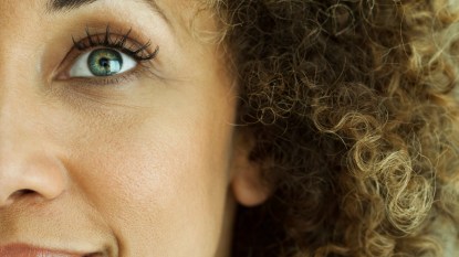 Woman with beautiful, long eyelashes after using tubing mascara