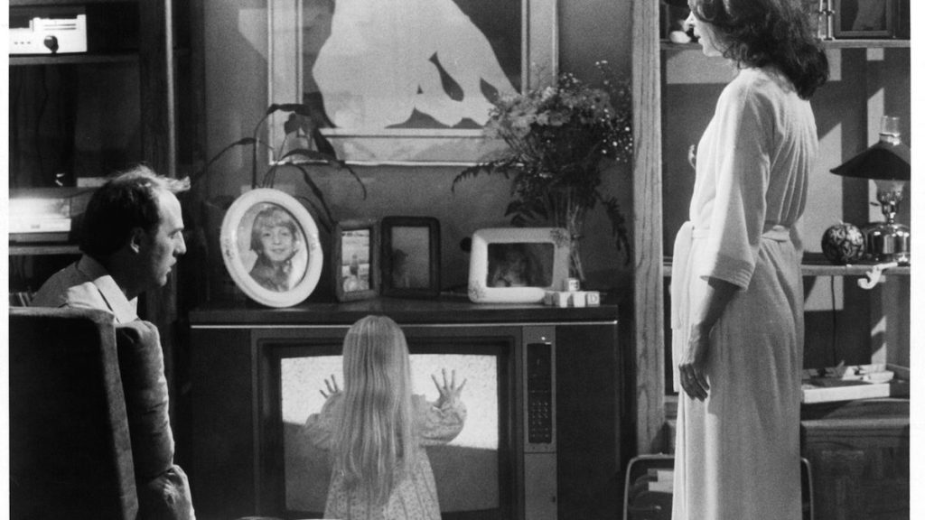 Craig T Nelson, Heather O'Rourke and JoBeth Williams in a scene from Poltergeist, 1982