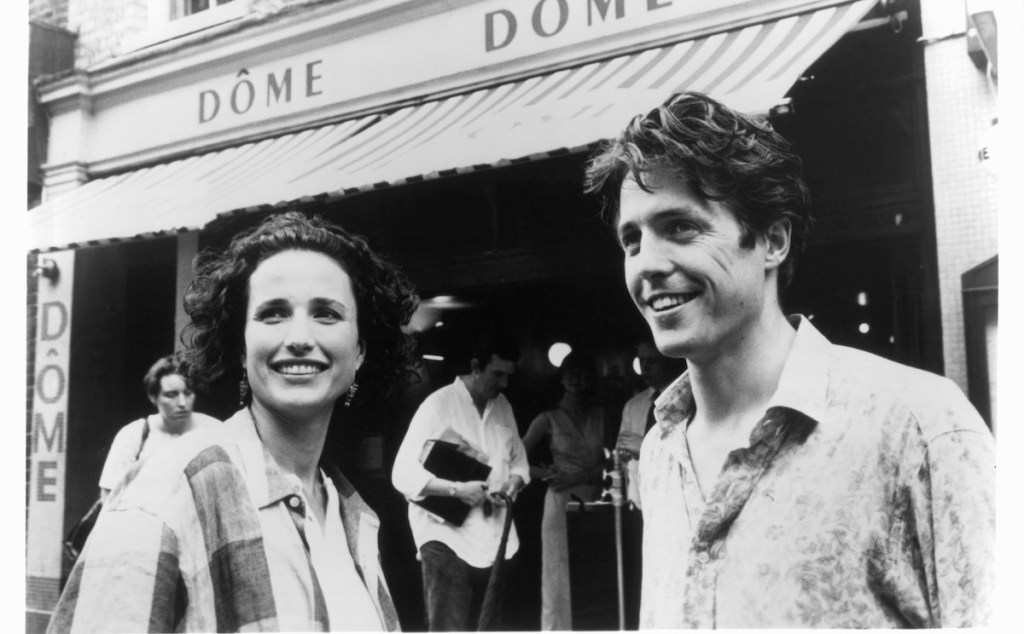 Andie MacDowell And Hugh Grant on a shopping trip in a scene from the film 'Four Weddings And A Funeral', 1994. (Photo by Gramercy Pictures/Getty Images)