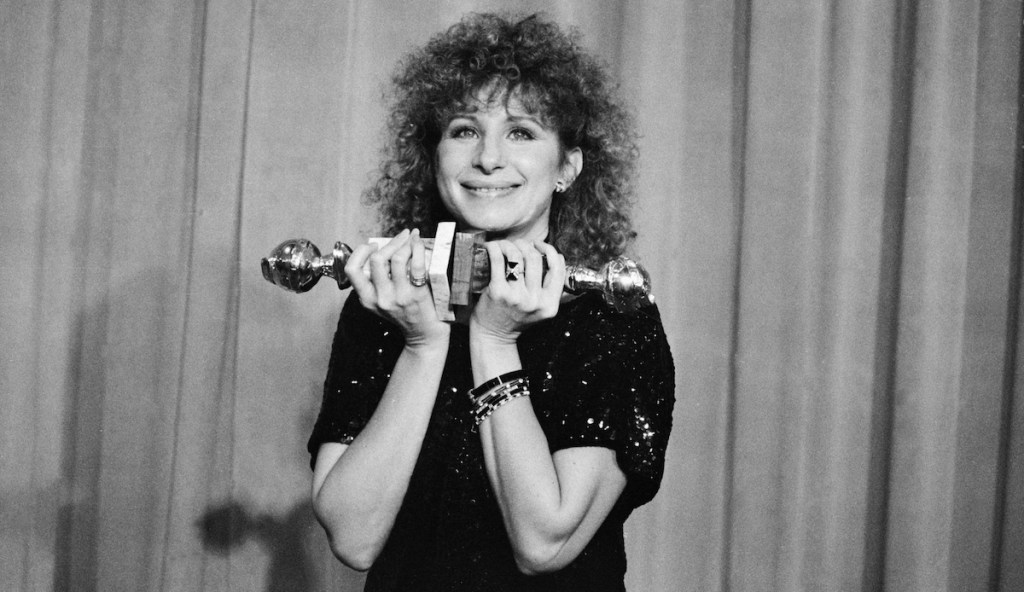 Barbra Streisand with her Golden Globe awards for 'Yentl,' 1984
