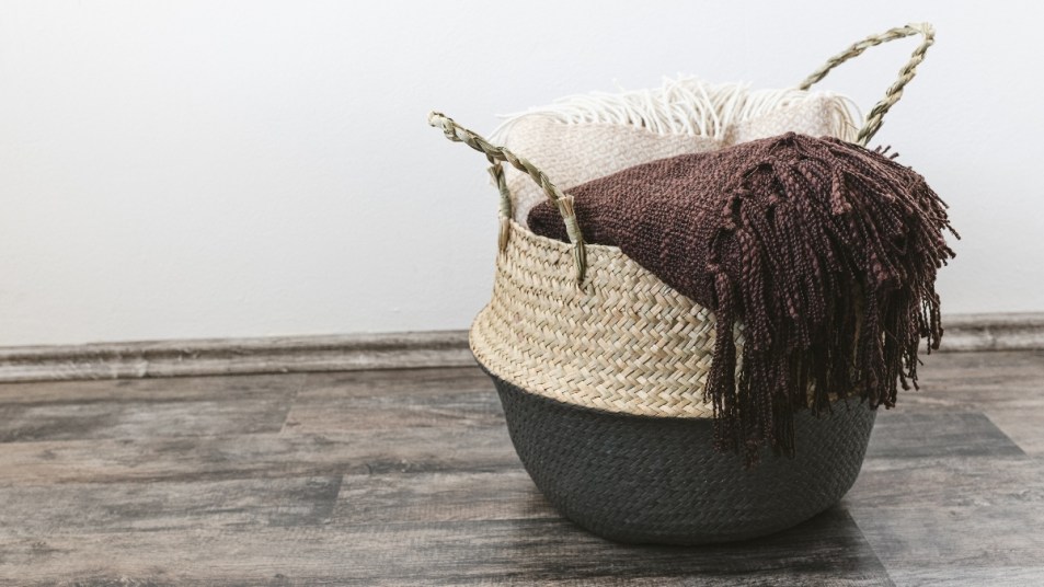 Seagrass baskets are one of many blanket storage ideas