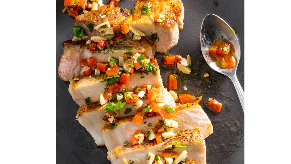 A recipe for Sous Vide Boneless Thick-Cut Pork Chops with Red Pepper and Almond Relish
