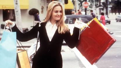 Woman holding shopping bags ; Alicia Silverstone movies