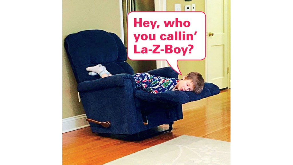 Funny photos: Boy sleeping in recliner with caption, "Hey, who you callin' La-Z-Boy?"