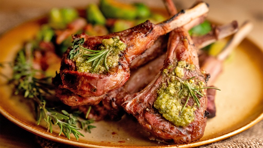 Garlic lamb chops topped with a tapenade made from Castelvetrano olives