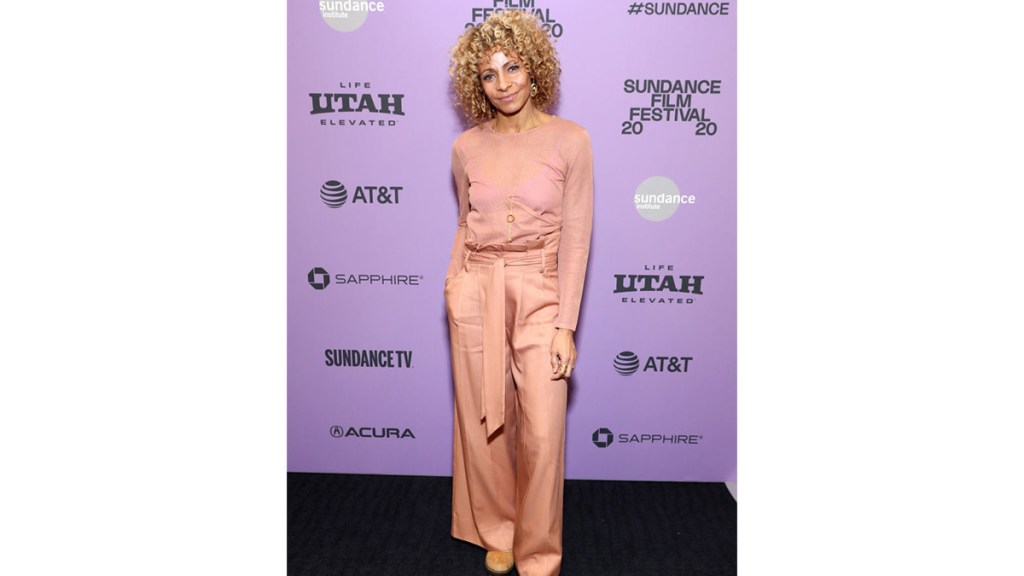 Michelle Hurd wearing peach fuzz, Pantone Color Of The Year 2024